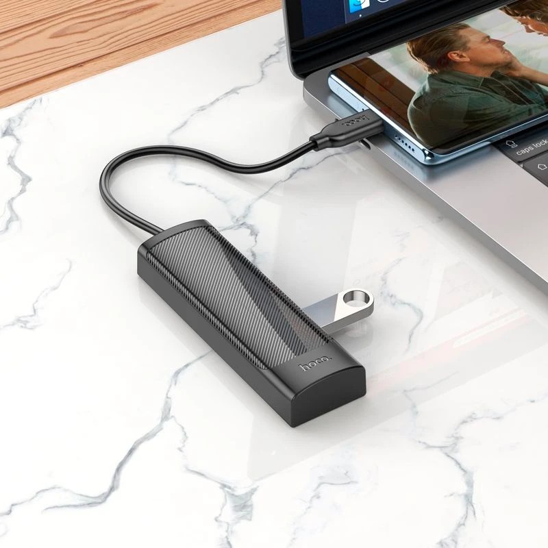 картинка HUB 4-port Hoco HB41, 4xUSB3.0, 0.2м, черный от магазина КомпьютерЦентр