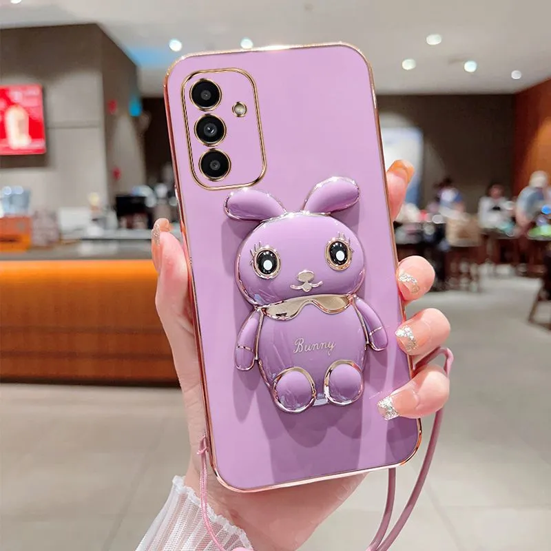картинка Чехол для Samsung Galaxy A14 со складной трехмерной подставкой ''Кролик'', пурпурный от магазина КомпьютерЦентр