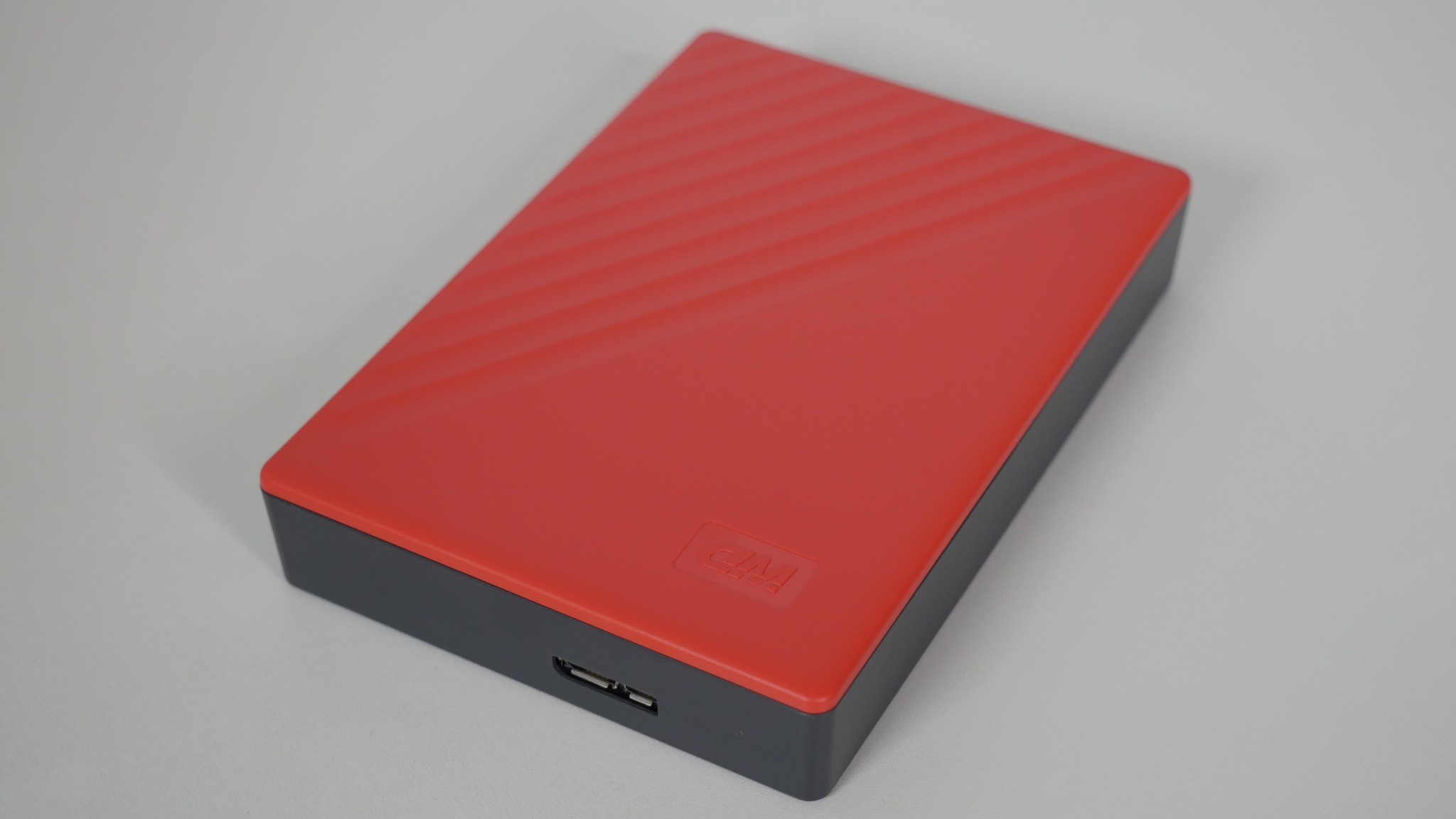 картинка HDD внешний 4Tb WesternDigital 2.5''; My Passport USB 3.0 Red (WDBPKJ0040BRD-WESN) от магазина КомпьютерЦентр